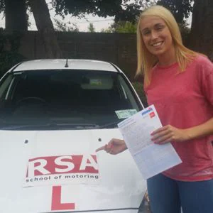 A learner celebrating passing the driving test in Tallaght